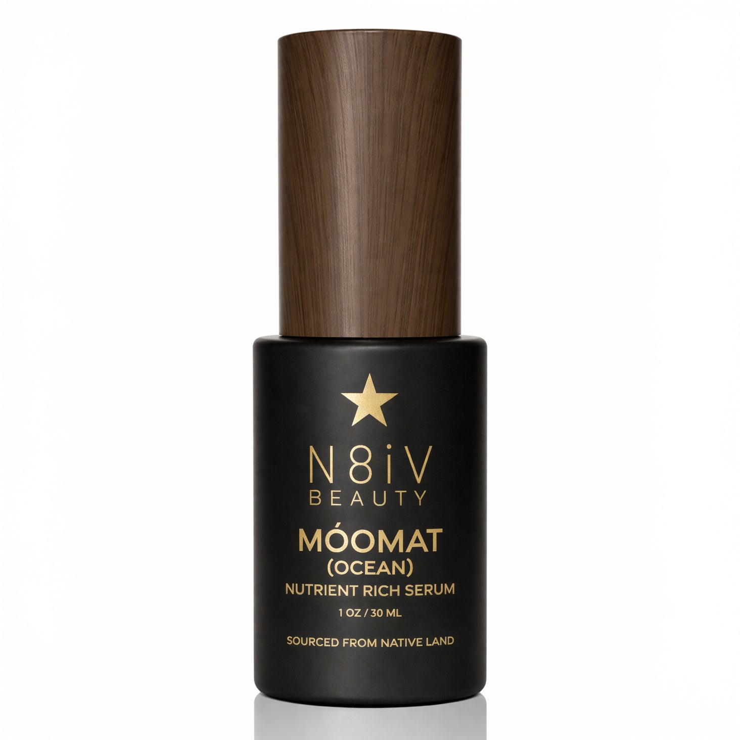 N8iv Beauty Moomat Black serum bottle with wooden cap on a white background