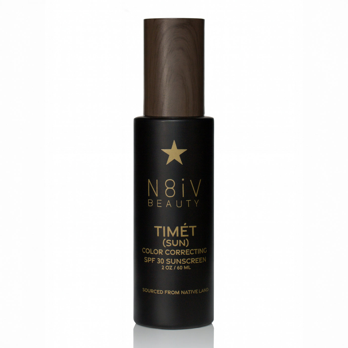 Black bottle of N8iv Beauty Timét Sun color correcting sunscreen on a white background